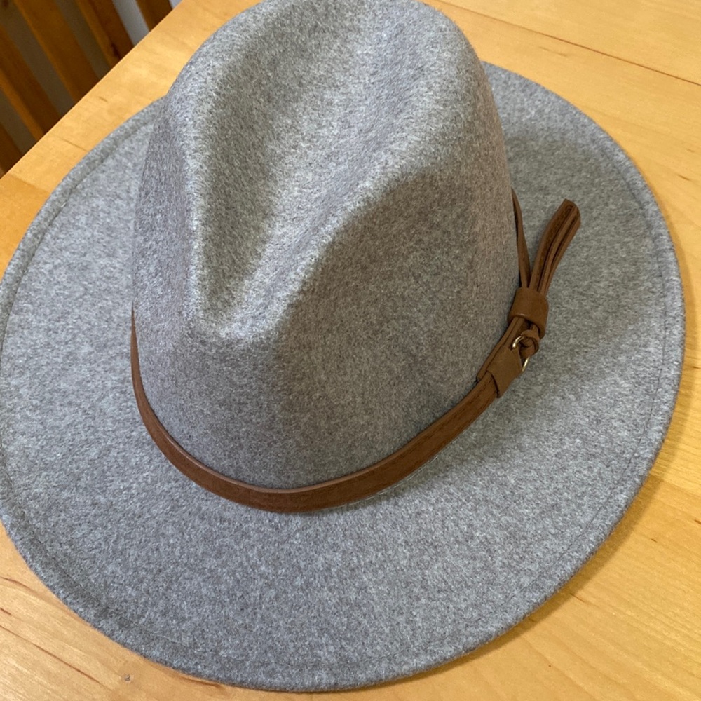 Wool blend fedora new without tags. Adjustable with tan leather belted trim